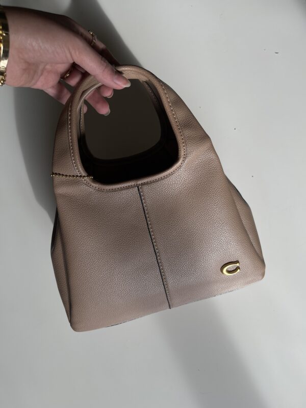 Coach - Image 2